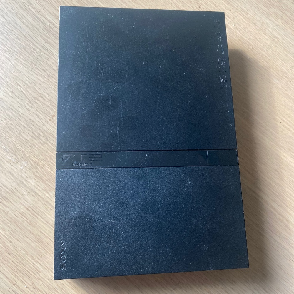 Sony PlayStation 2 Console Slim For Parts Doesn’t Read Disks